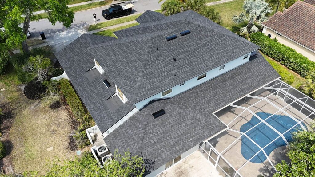 Aerial view of completed roof replacement on single-story home in St. Petersburg Florida